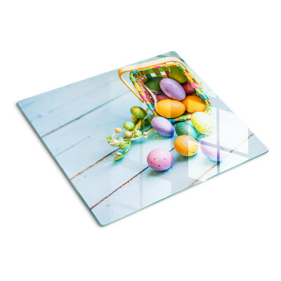 Tocător sticlă Ouă colorate de Paște într-un coș