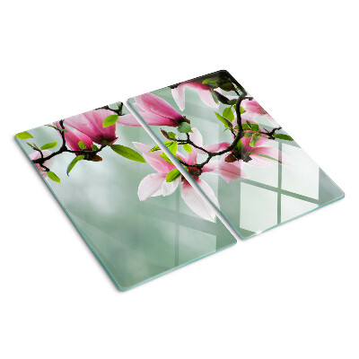 Tocător sticlă Flori de magnolie pe un fundal verde