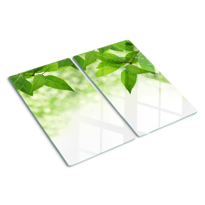 Tocător de bucătărie Frunze pe un fundal verde neclar