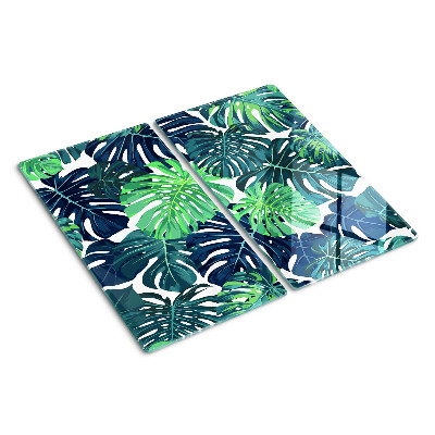 Tocător sticlă Frunze de Monstera pe un fundal tropical