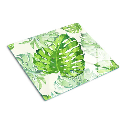 Tocător sticlă Frunze de Monstera pe un fundal deschis
