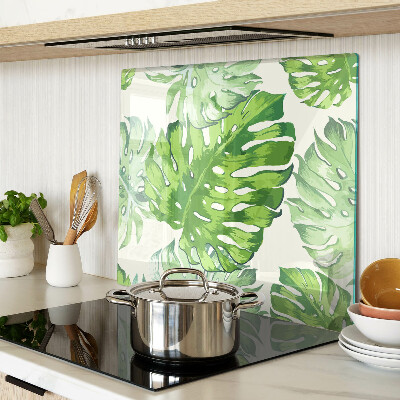 Tocător sticlă Frunze de Monstera pe un fundal deschis