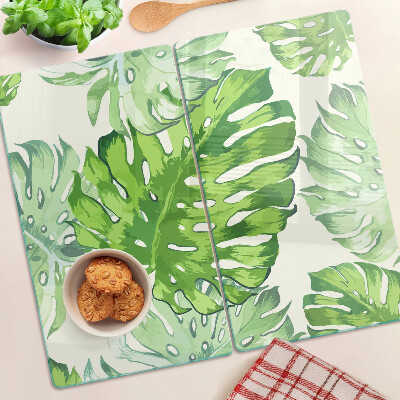 Tocător sticlă Frunze de Monstera pe un fundal deschis
