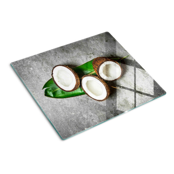 Tocător sticlă Nucă de cocos pe fundal de beton