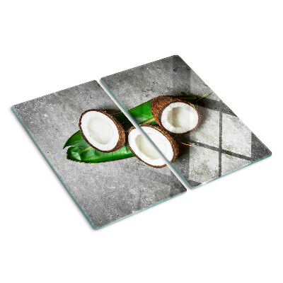 Tocător sticlă Nucă de cocos pe fundal de beton