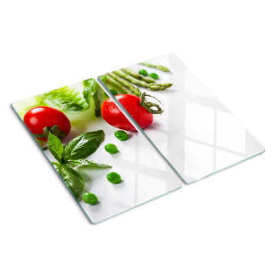 Tocător de bucătărie Legume pe un blat alb