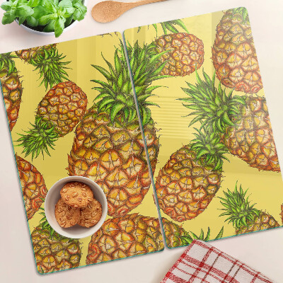 Tocător sticlă Ananas pe un fundal galben