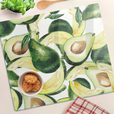 Tocător sticlă Avocado pe un fundal de frunze
