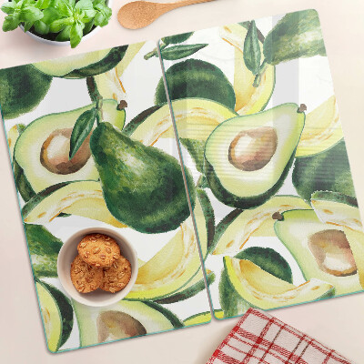 Tocător sticlă Avocado pe un fundal de frunze