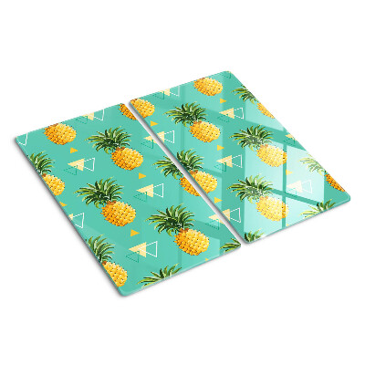 Tocător de bucătărie Ananas pe un fundal turcoaz