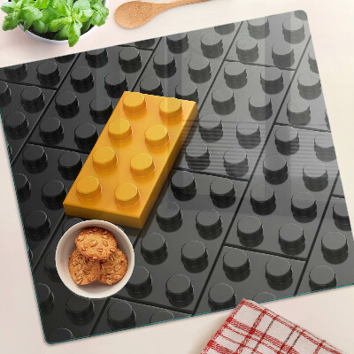 Tocător de bucătărie Cărămizi LEGO pe fundal negru
