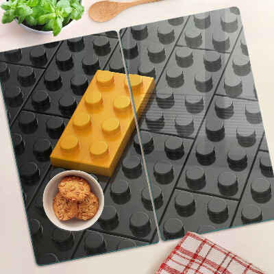 Tocător de bucătărie Cărămizi LEGO pe fundal negru