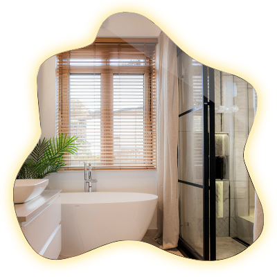 Oglindă în formă de pată iluminată cu LED-uri