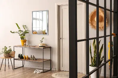 Oglindă de perete cu ramă argintie cu aspect modern