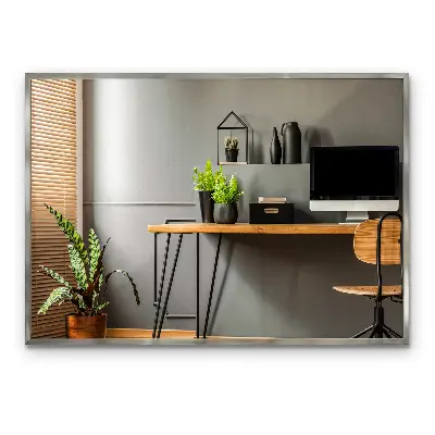 Oglindă de perete cu ramă argintie cu aspect modern