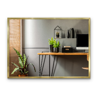 Oglindă de perete cu ramă aurie cu design elegant