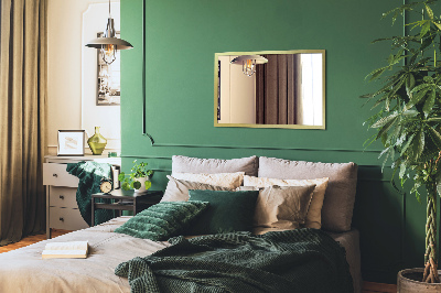 Oglindă de perete cu ramă aurie cu design elegant