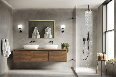 Oglindă de perete cu ramă aurie cu design elegant