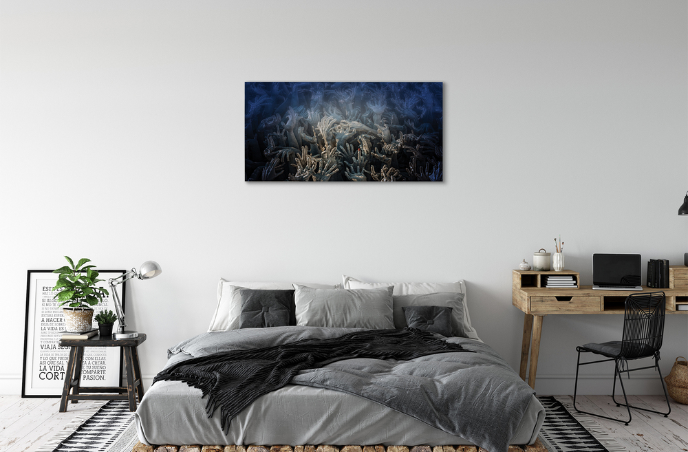 Tablouri canvas Mâinile de lumină albastră