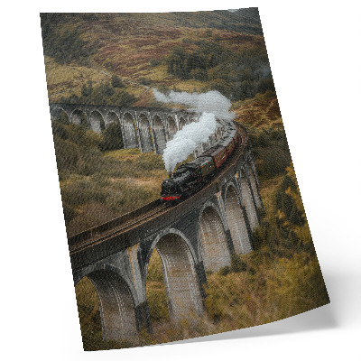 Poster în culori saturate Un tren pe un pod printre dealuri verzi