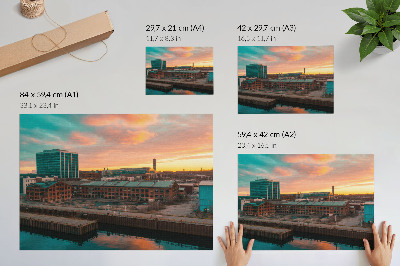 Poster Clădiri industriale apus de soare atmosferă liniștită