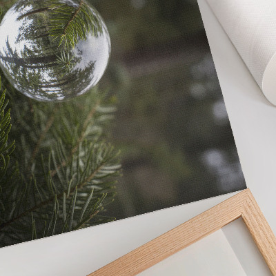 Poster retro Un glob de cristal pe fundalul unei crengi de pin