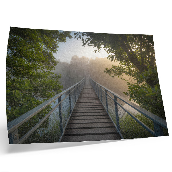 Poster pentru perete Un pod în ceață peste un râu într-un cadru verde