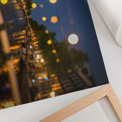 Poster pentru perete Un oraș fermecător noaptea, lumini reflectate în apă