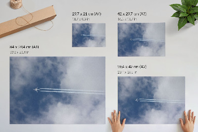 Poster Avion pe cerul albastru cu dungi albe