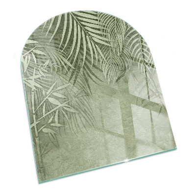 Sticlă sub șemineu semi-oval Frunze tropicale în fundal