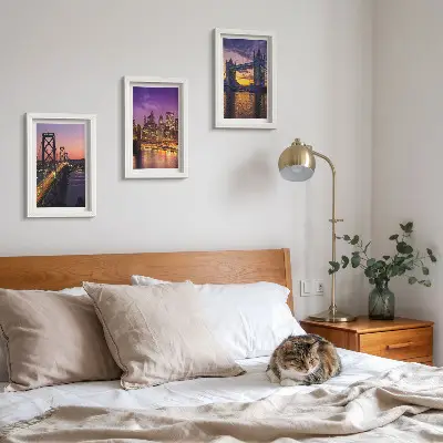 Galerie de perete cu poduri și peisaje urbane la apus