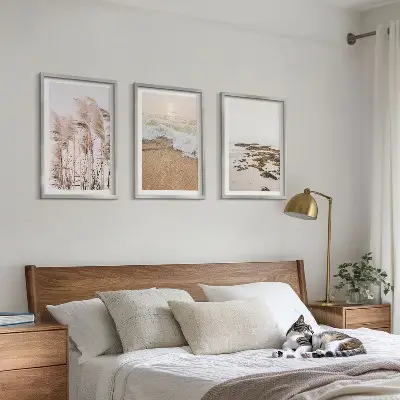 Set de tablouri pentru dormitor cu model boho reprezentând iarbă de plajă, valuri și pietre