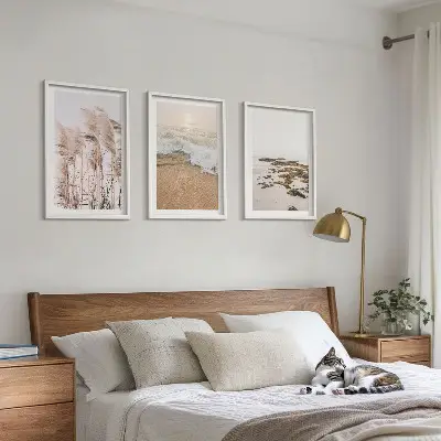 Set de tablouri pentru dormitor cu model boho reprezentând iarbă de plajă, valuri și pietre